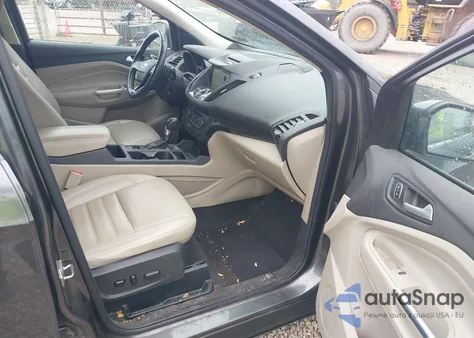 2017 Ford Escape Titanium z USA, uszkodzony, nr VIN 1FMCU0J99HUA84382